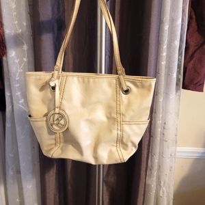 Kim Roger's white purse
